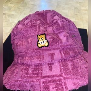 NWOT Fuchsia/purple terry cloth bucket hat in a one size from Teddy Fresh!